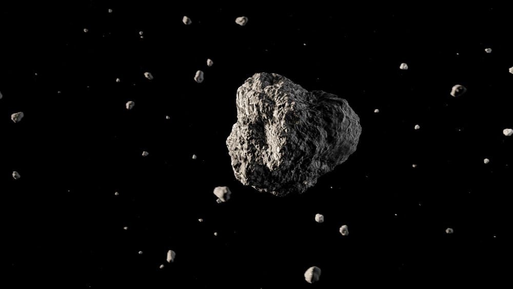 un grande asteroide che vola nello spazio esterno