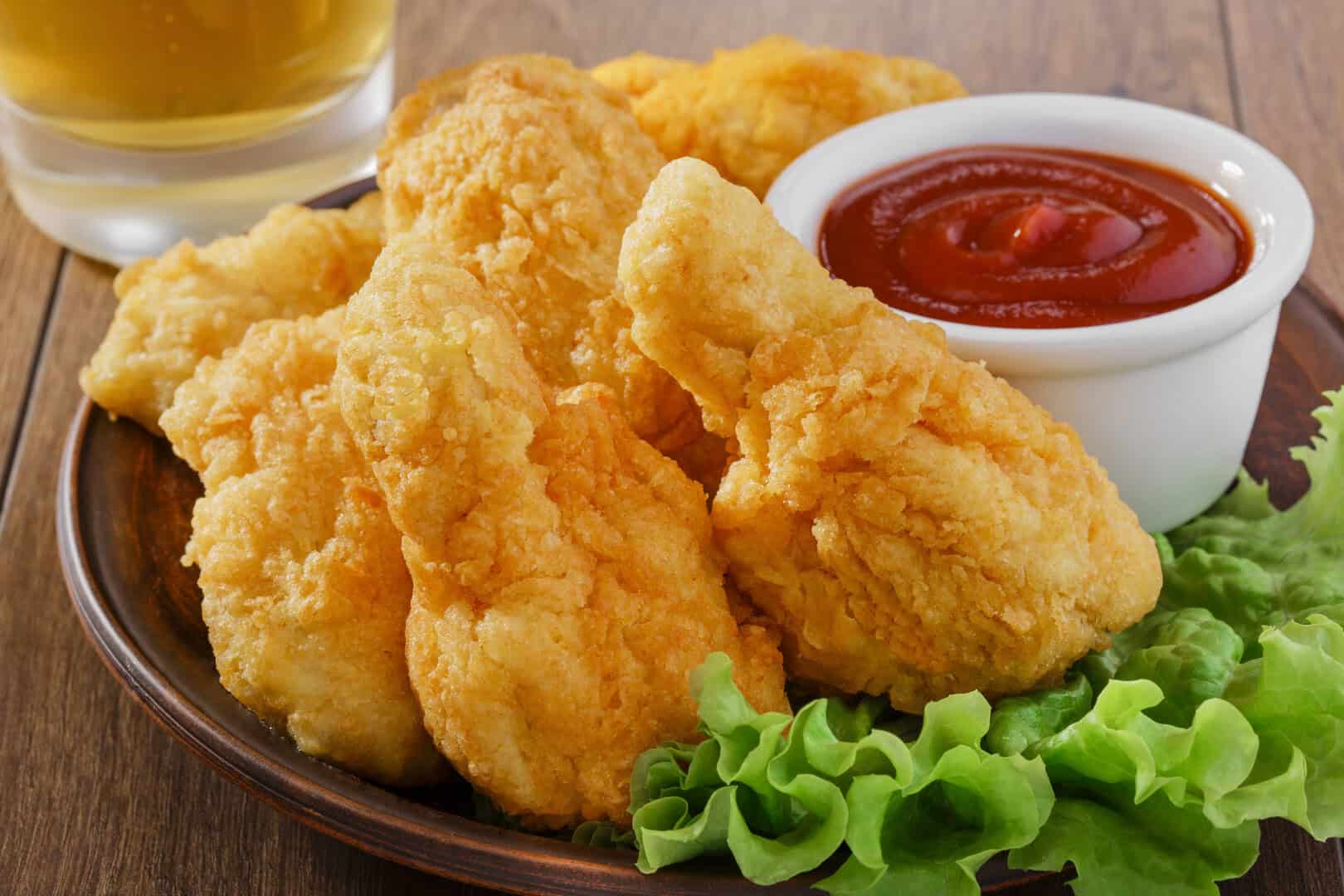 ketchup e pollo alimenti non salubri